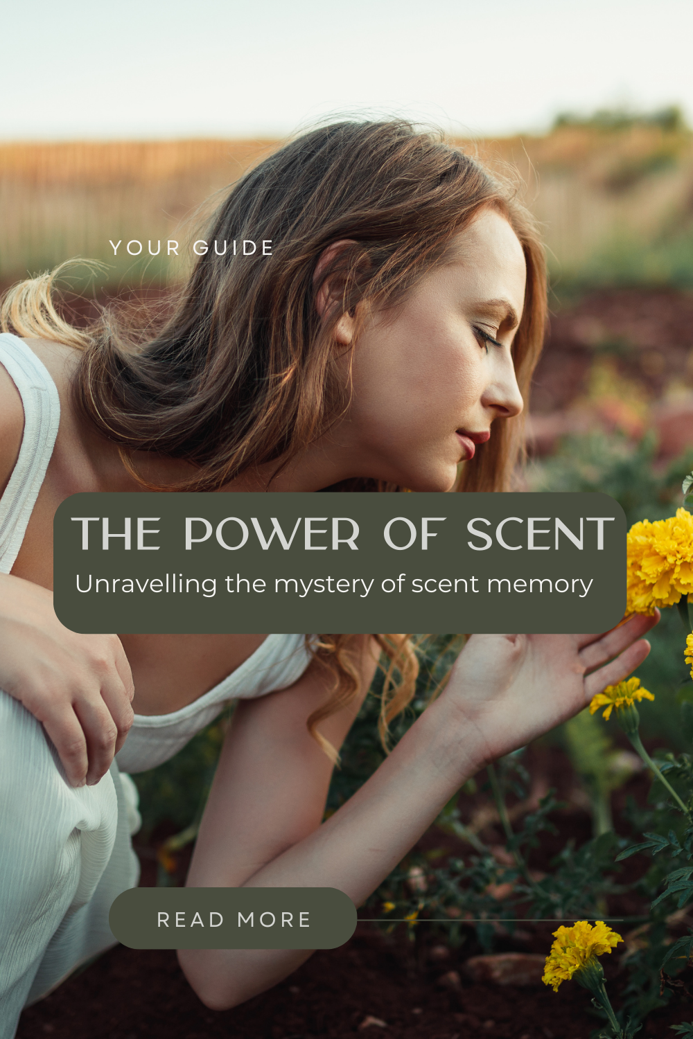 Image of a woman in an open field wearing a white dress, bending down to smell a bunch of bright yellow flowers